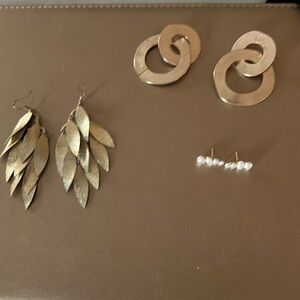 Three sets of earrings